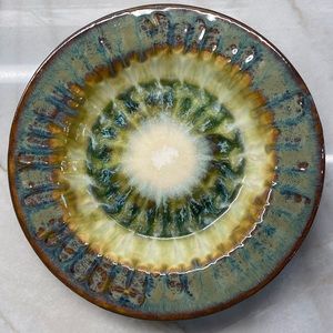 The Good Earth 7 5/8” rimmed bowl.Bluebird pattern